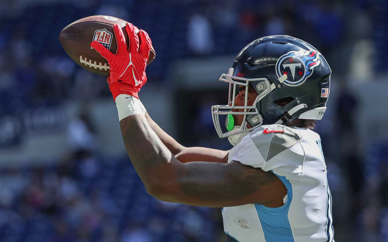 A.J. Green of the Cincinnati Bengals runs after the catch as Corey News  Photo - Getty Images