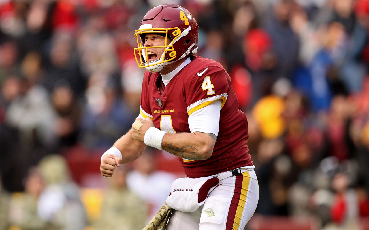 Washington Commanders quarterback Taylor Heinicke (4) passes