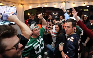 NFL fans in a bar